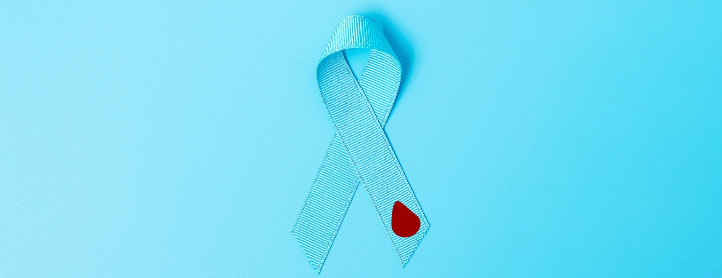 Light blue ribbon with red blood drop.
