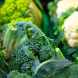 Bunches of broccoil and cauliflower.