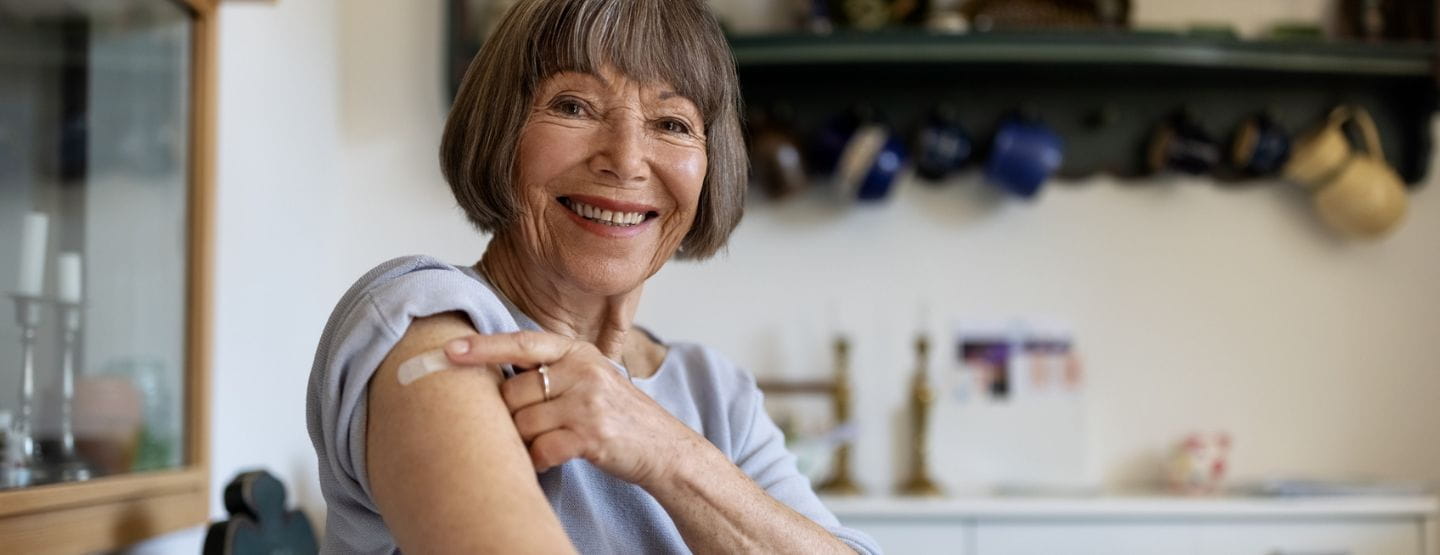 Senior woman feeling proud after getting vaccine