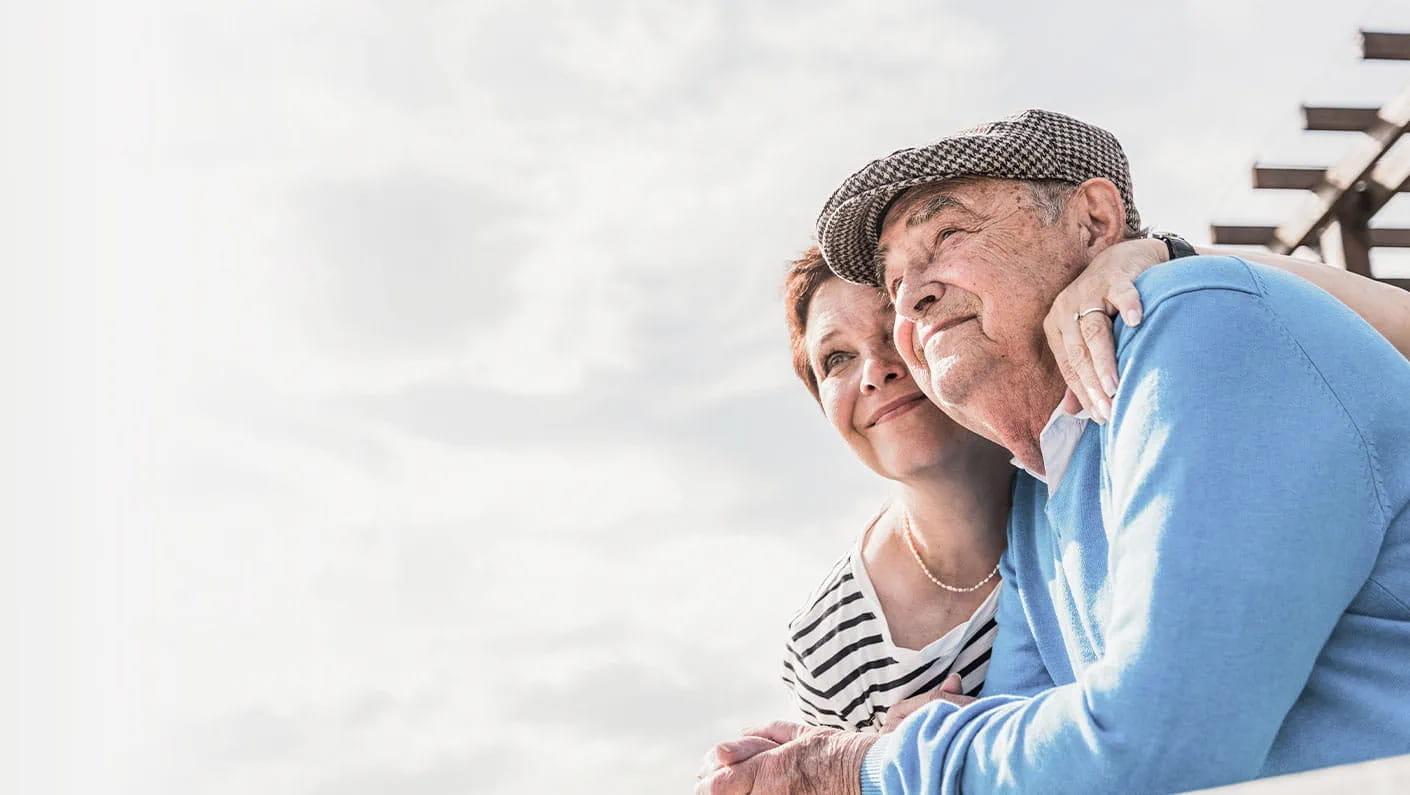 Older couple embracing