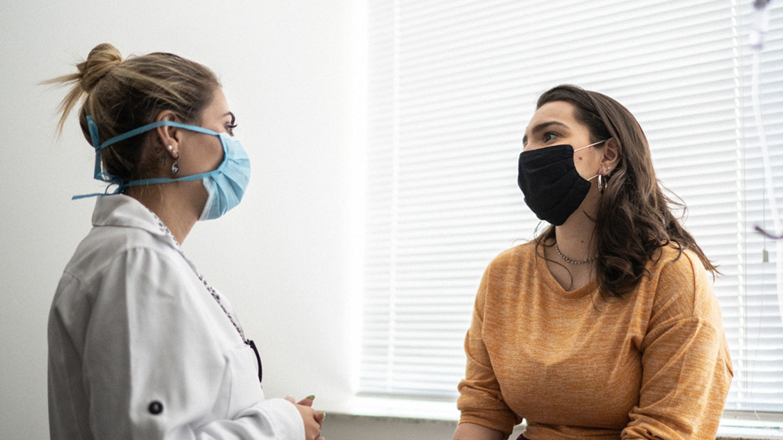  a doctor and patient speak