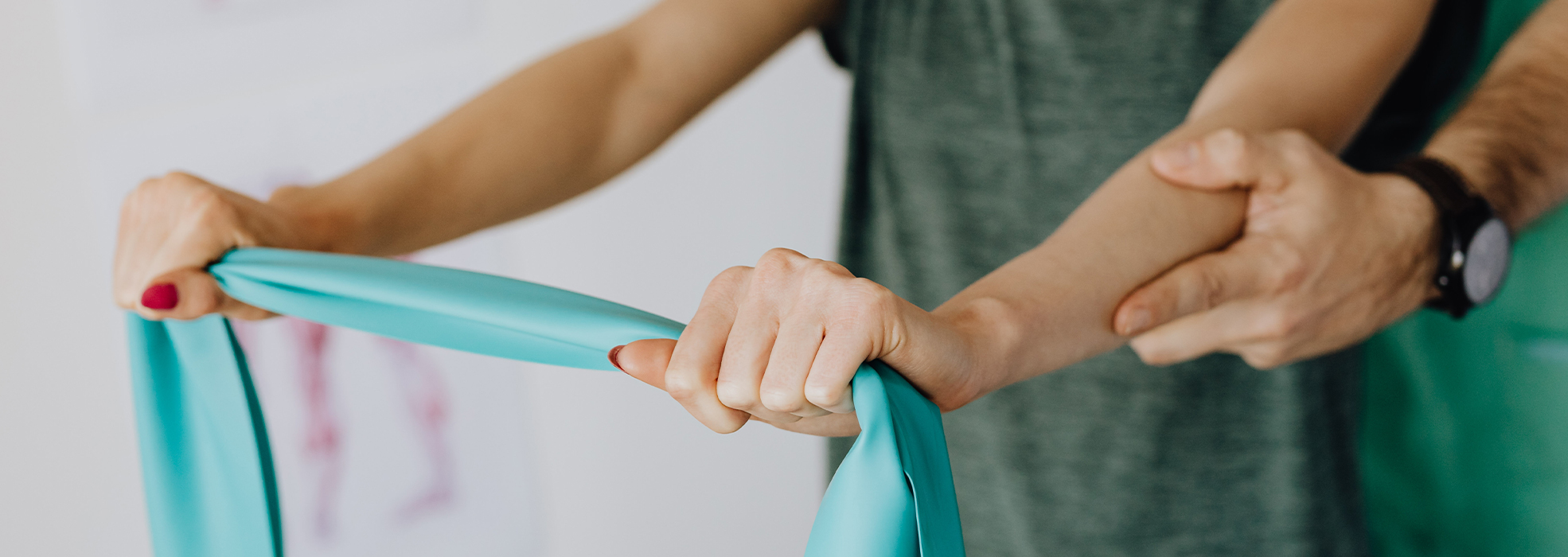 A patient using a strength band