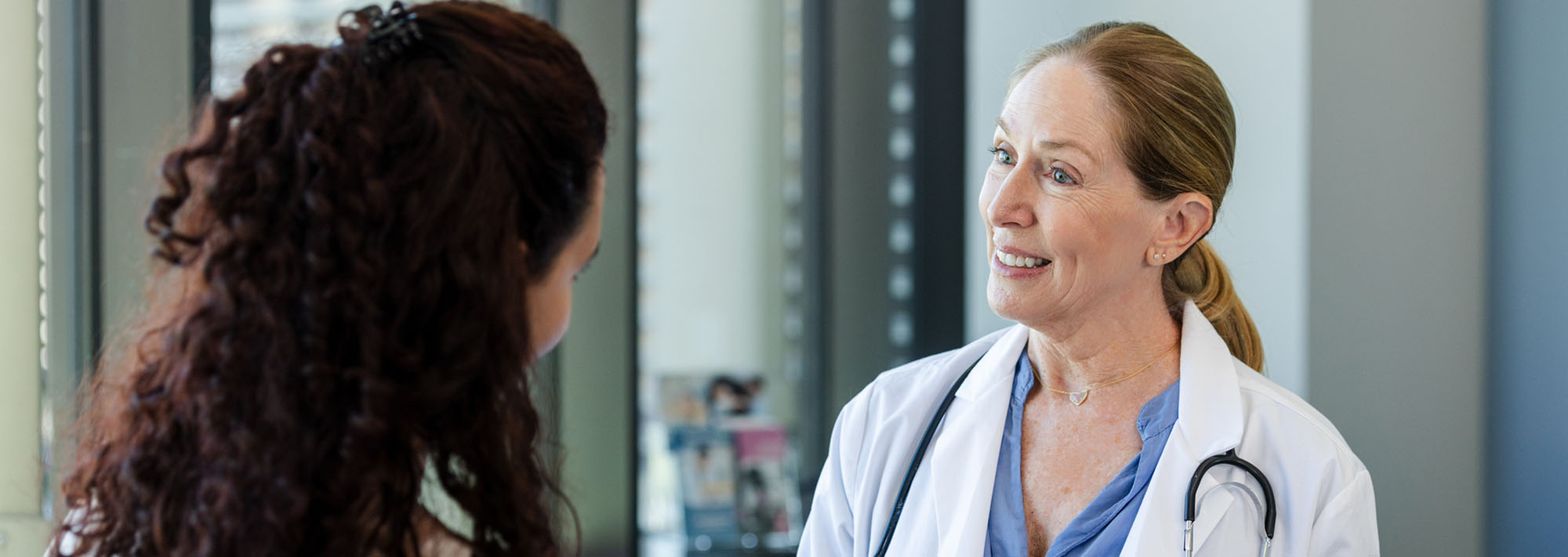 a friendly doctor consults with a patient