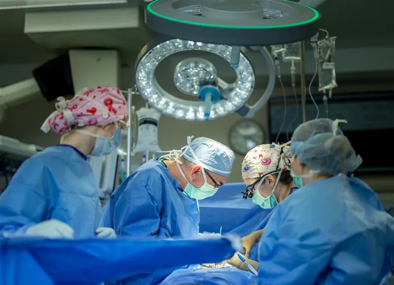 image of vascular surgeons in an operating room