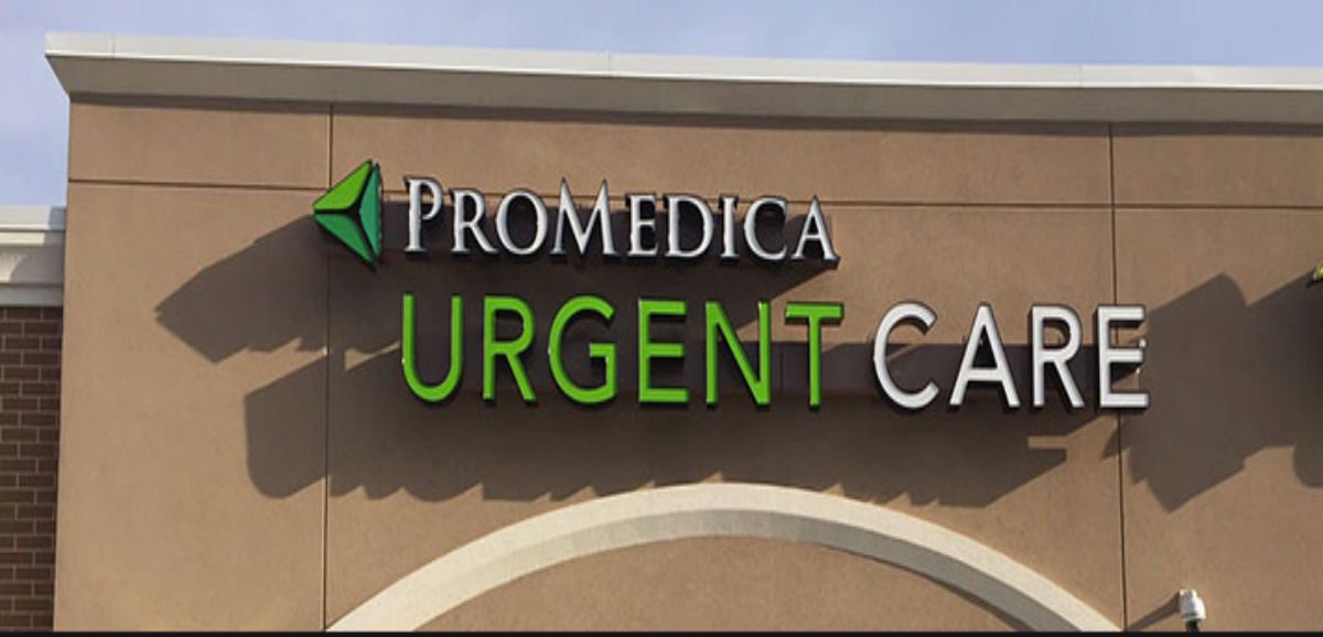 An image of the ProMedica Urgent Care light up sign on the urgent care building.